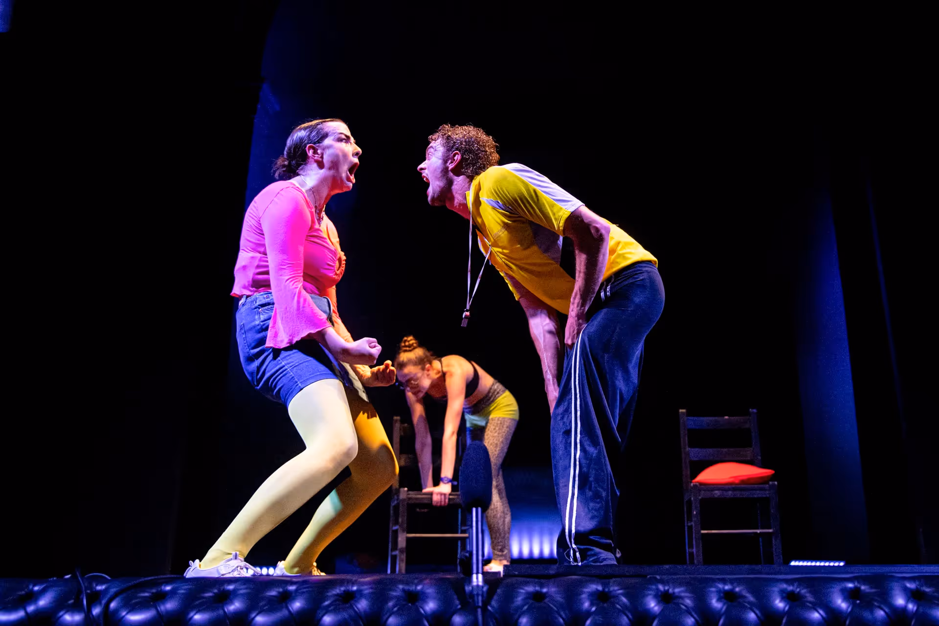 Festival di Spoleto performers engage in intense theatrical performance with vibrant colors