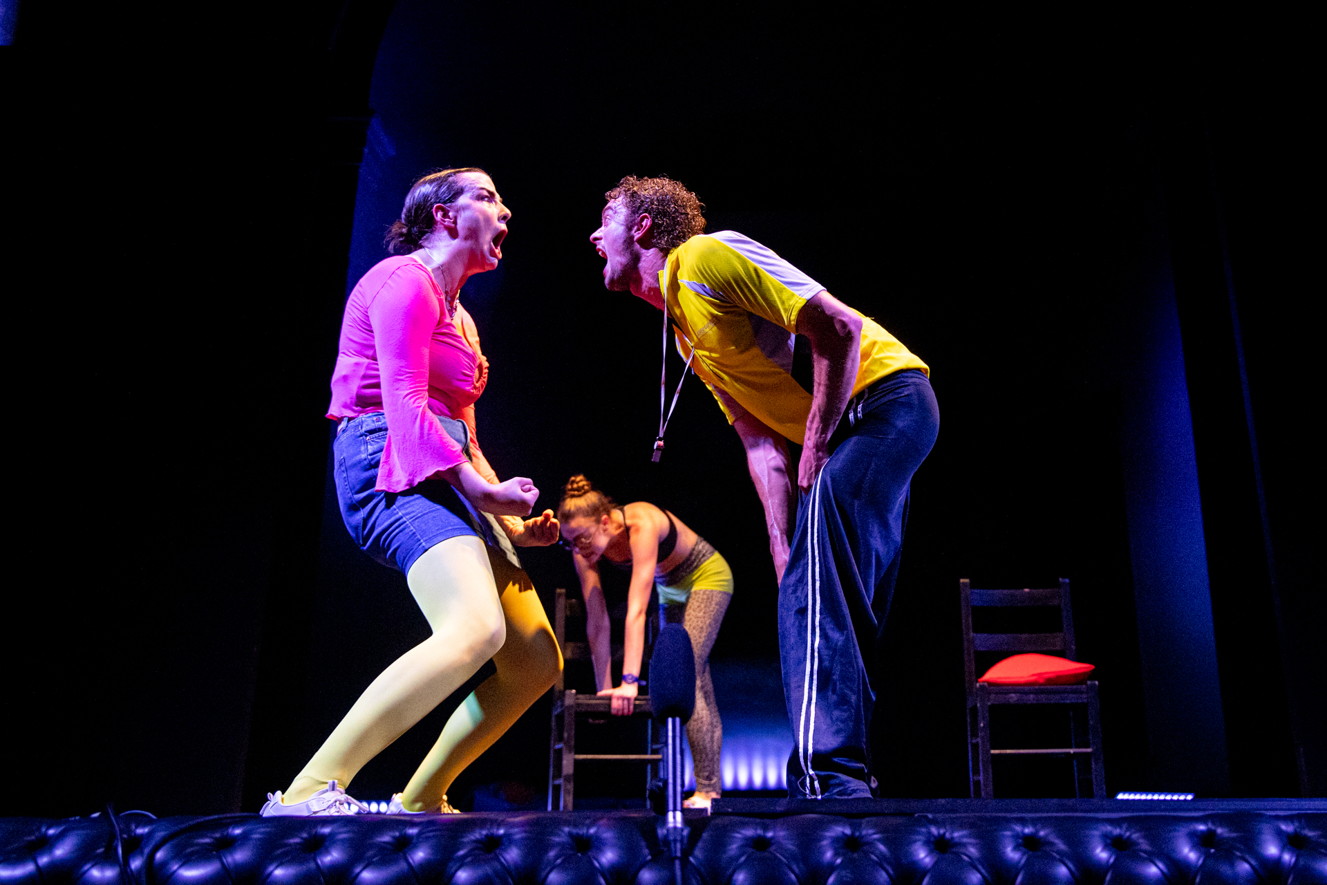 Festival di Spoleto performers engage in intense theatrical performance with vibrant colors