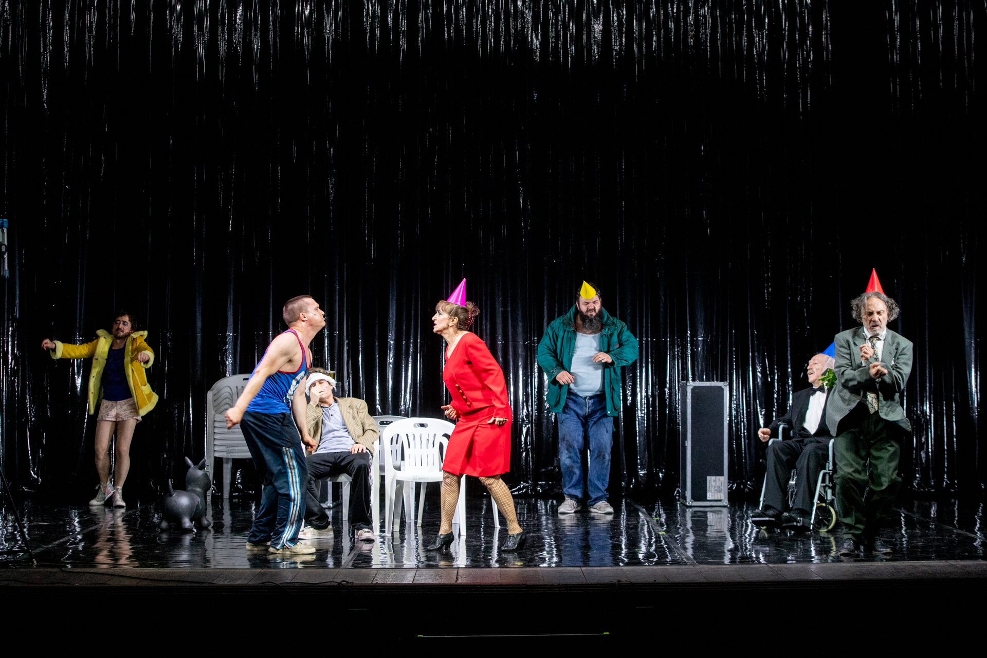 Theatrical performance at Festival di Spoleto with actors in colorful costumes