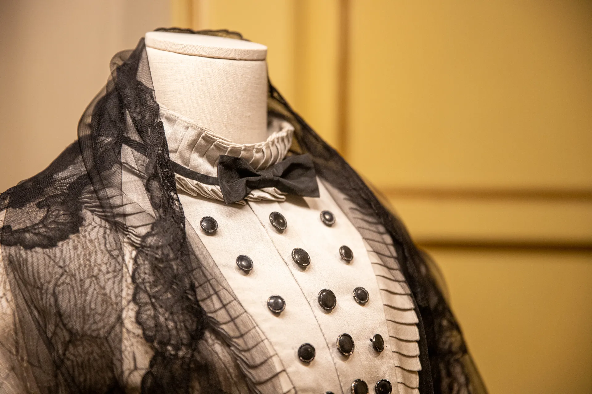 Vintage costume from Festival di Spoleto, featuring ornate lace and buttons