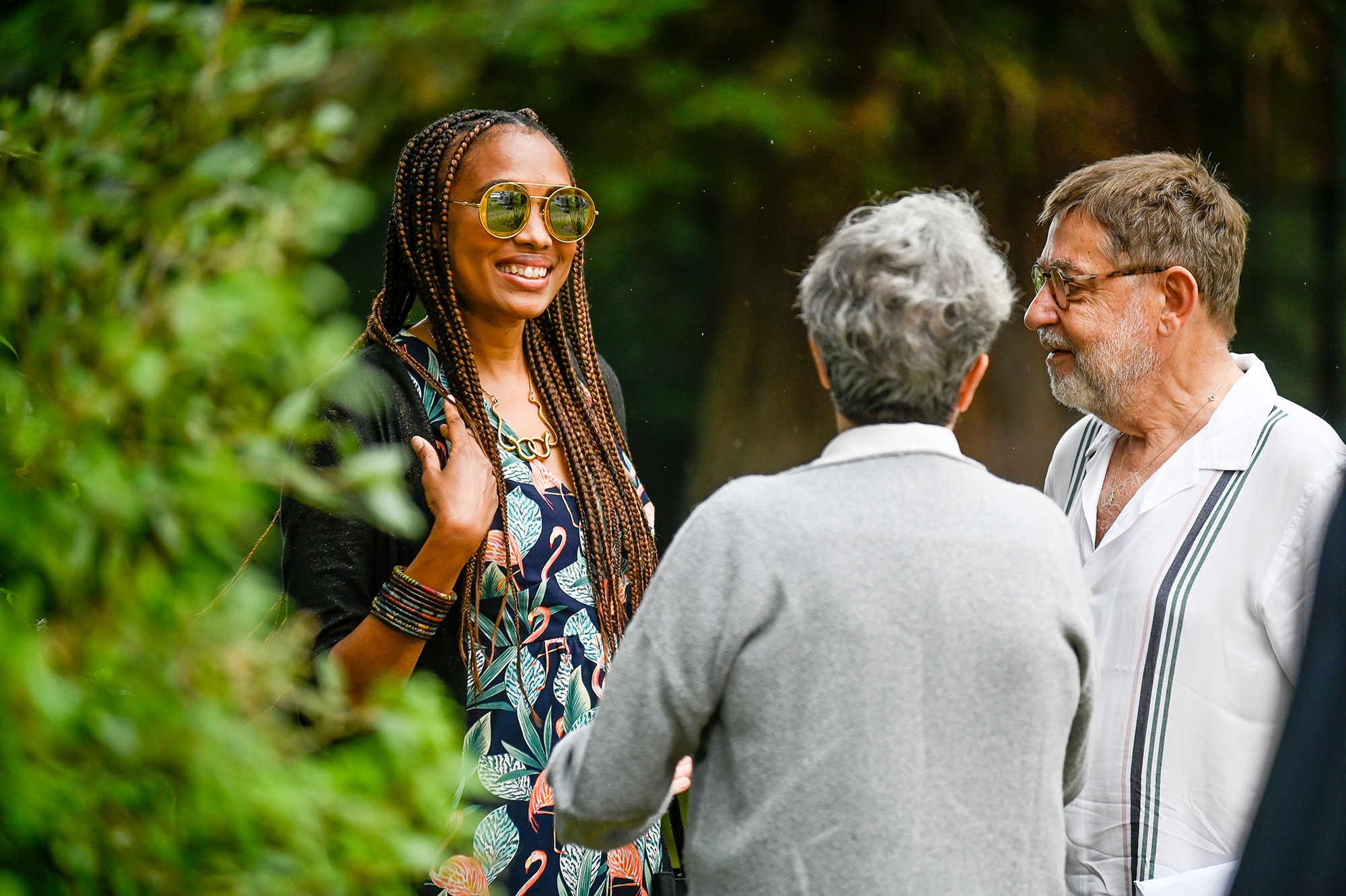 Festival di Spoleto gathering with diverse people enjoying conversation outdoors