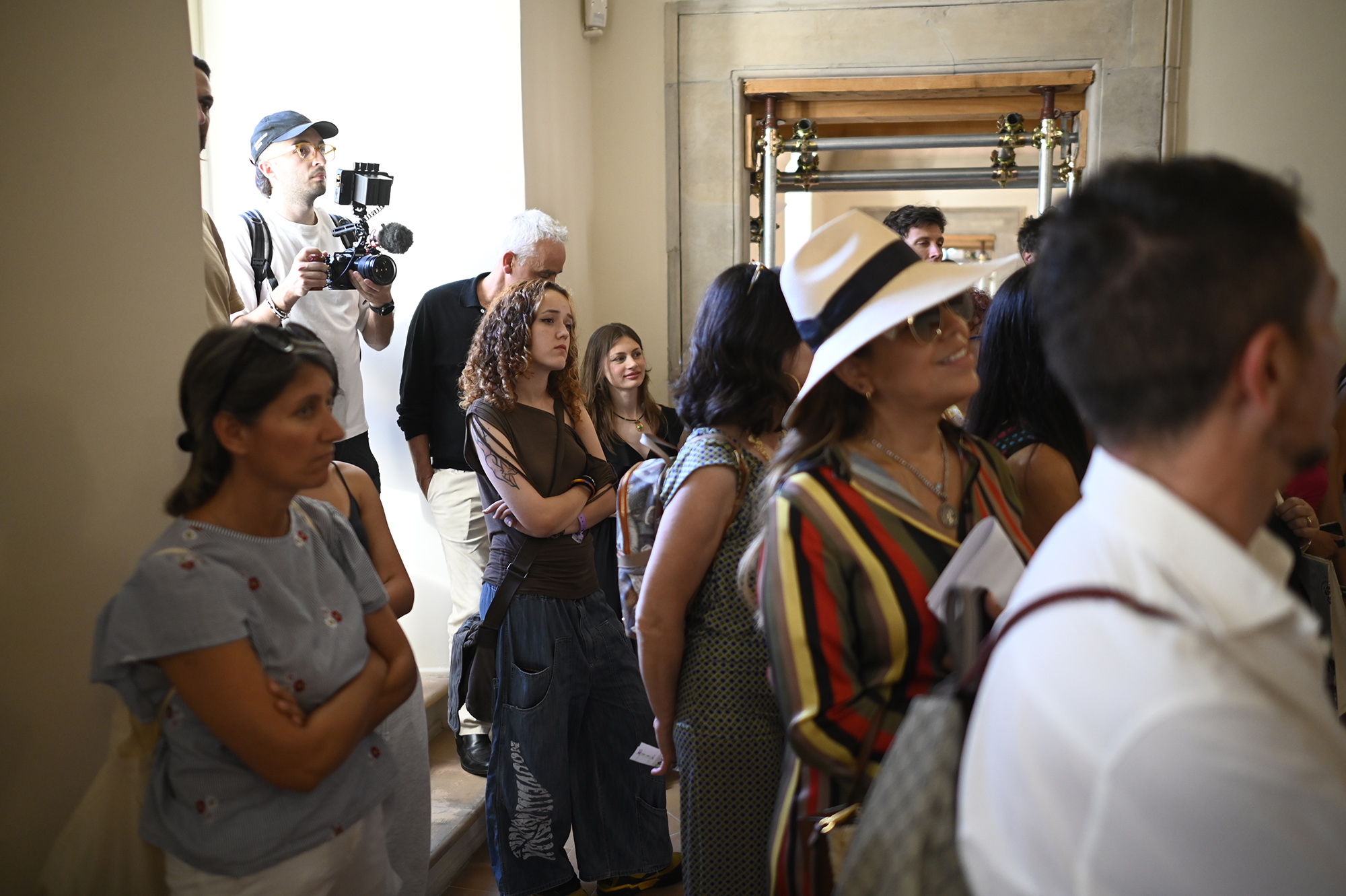 Festival di Spoleto backstage, diverse people gathered with camera operator