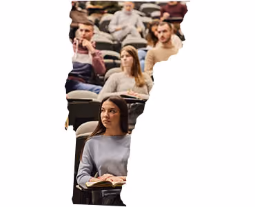 Students listening in a college lecture hall, Vermont