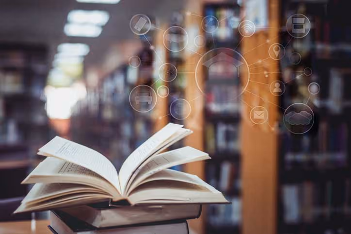 Open book in a library with digital icons representing technology and connectivity.