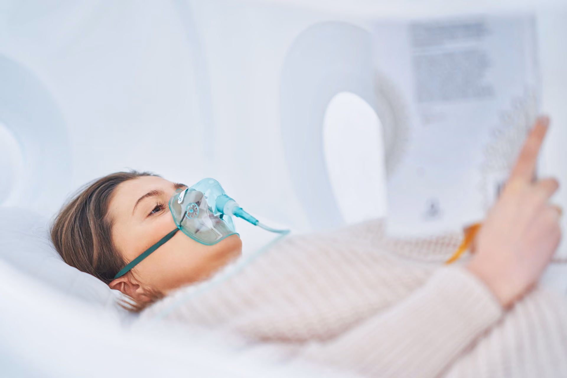Woman relaxing in HBOT Therapy