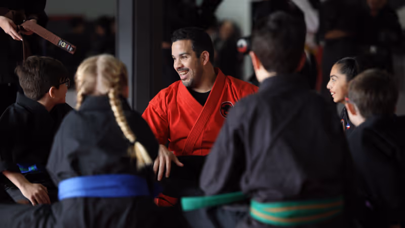 A USSD Chief Instructor teaches a student inside of his USSD Franchise school.