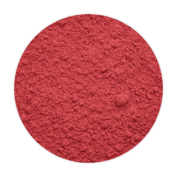 Fine, vibrant pink-red pomegranate powder in a soft, dry mound on a plain background