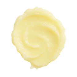 Creamy swirl of pale yellow duck fat with a smooth, glossy texture on a plain background