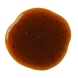 Glossy brown marinade with black pepper flecks, smooth and slightly thick texture on a plain background