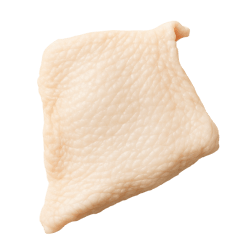 Raw chicken skin with pale colour, bumpy texture and natural folds, suitable as a nutritious dog food ingredient