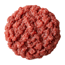Freshly ground rabbit formed into a round, pinkish-red patty with a moist, coarse texture, ready for dog food preparation