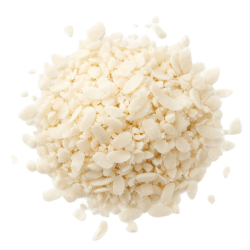 White, finely shredded coconut flakes in a small pile, dry and slightly rough, ideal for healthy dog treats and recipes