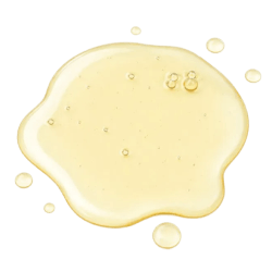 Pale yellow linalool liquid with a glossy, oily texture and small bubbles in a natural droplet form