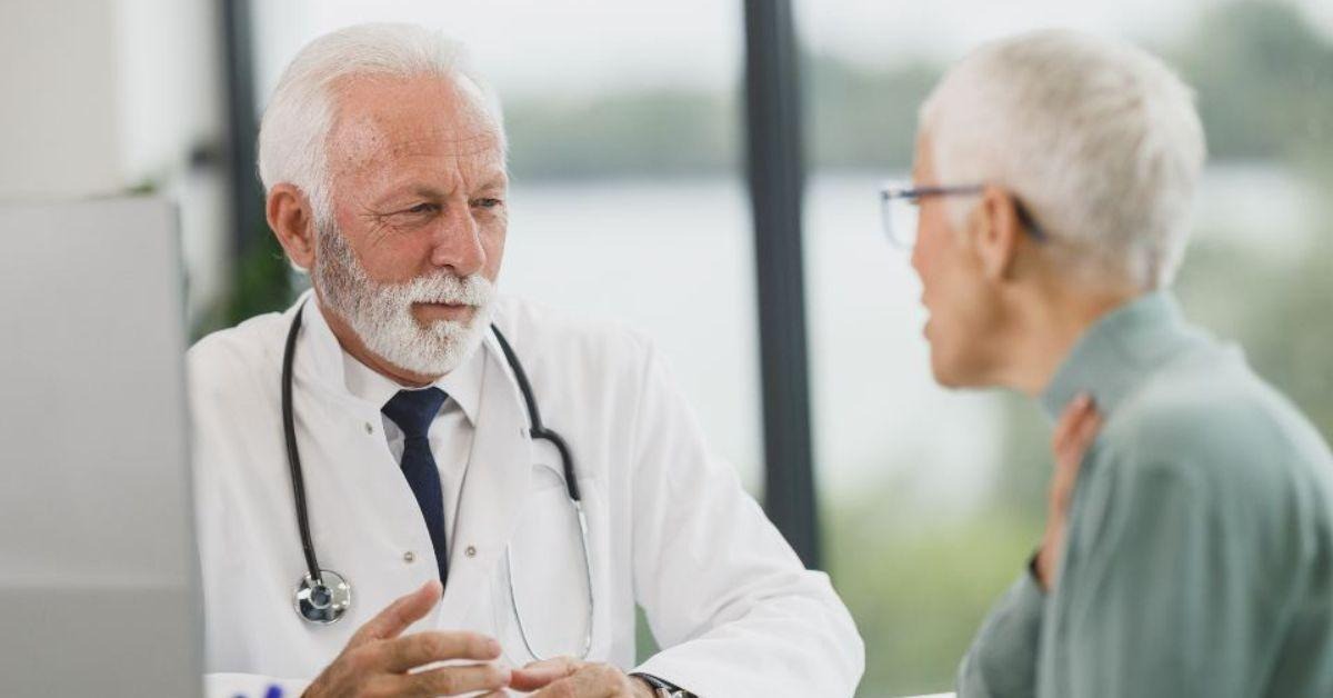 GP in a consultation with a patient at a general practice clinic