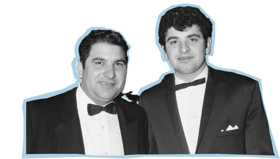 a photo of two men wearing tuxedos