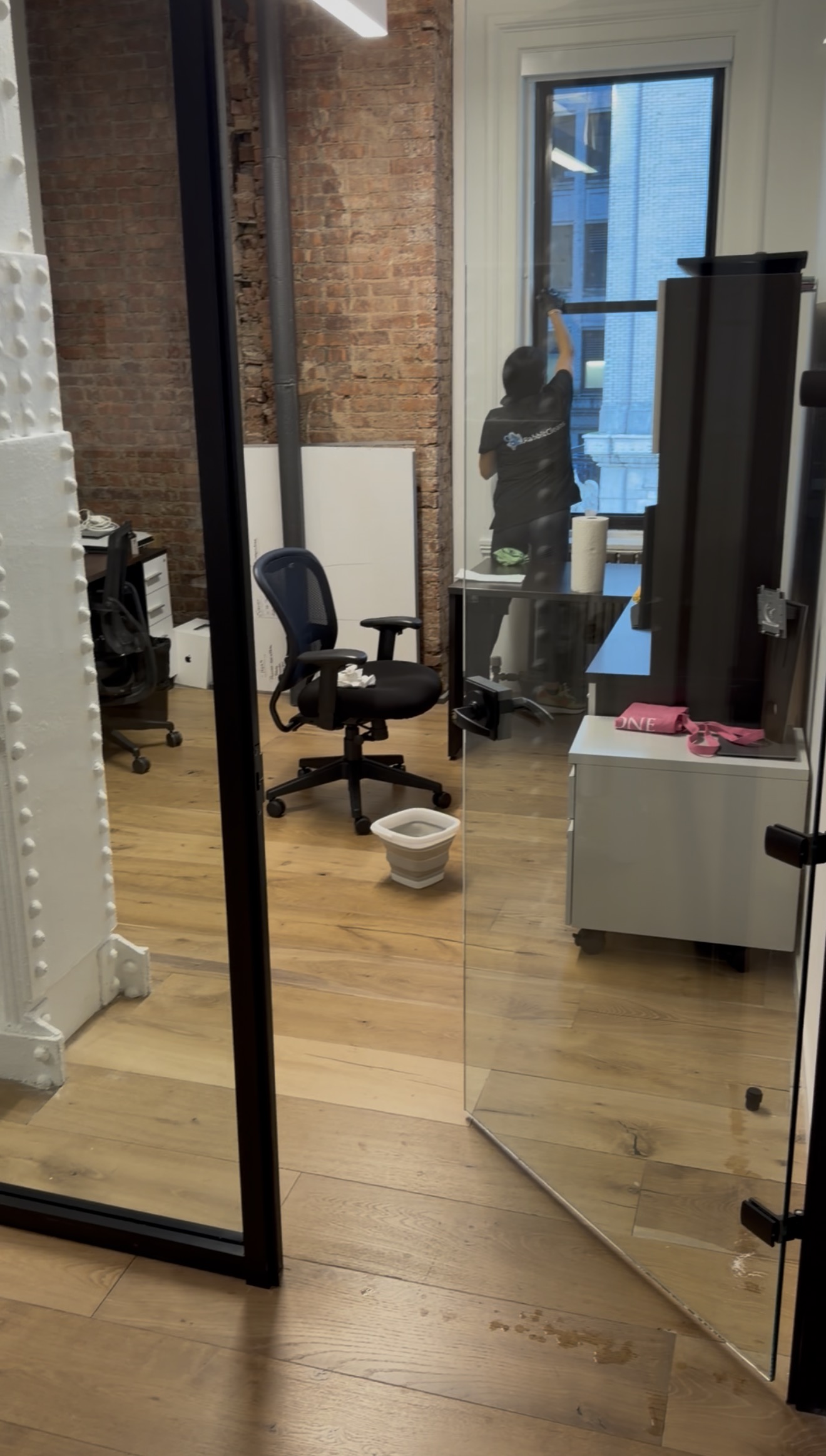 Office cleaning in Manhattan with glass partitions by RabbitCleans