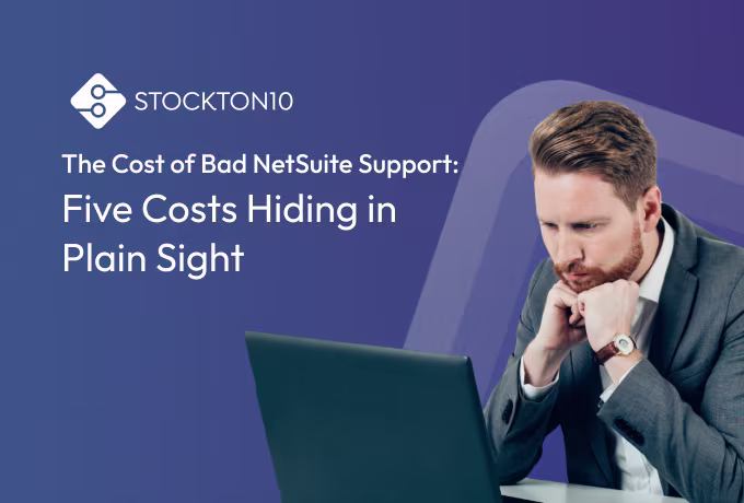 Business professional reviewing a laptop beside the headline “The Cost of Bad NetSuite Support: Five Costs Hiding in Plain Sight.
