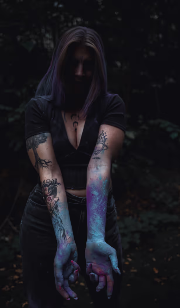 Instructor showing her hands filled with paint