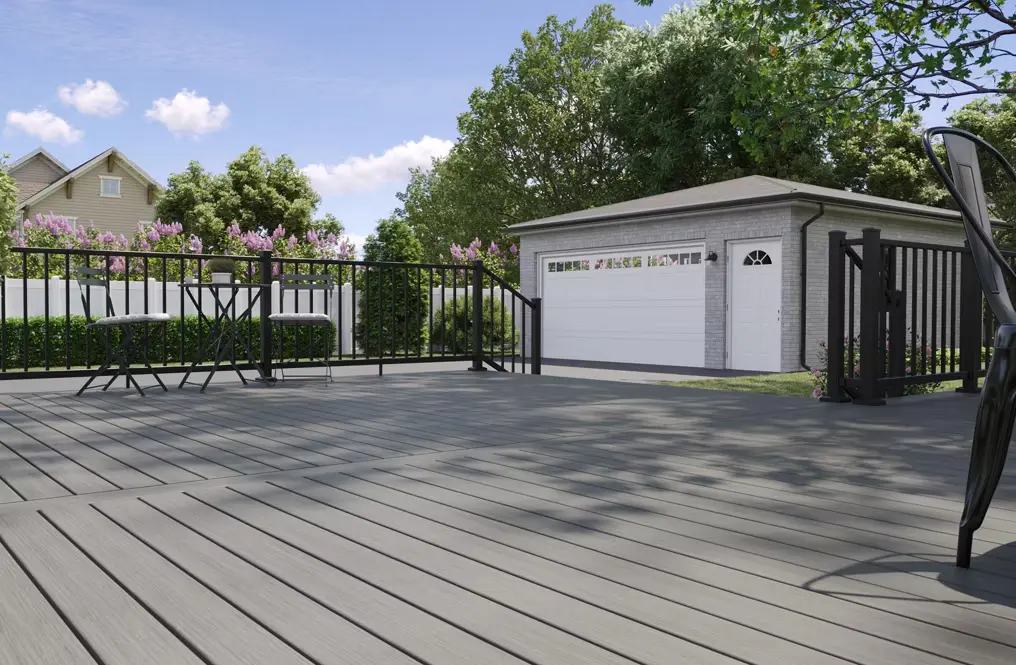 Trex composite deck with gray decking boards and black aluminum railings