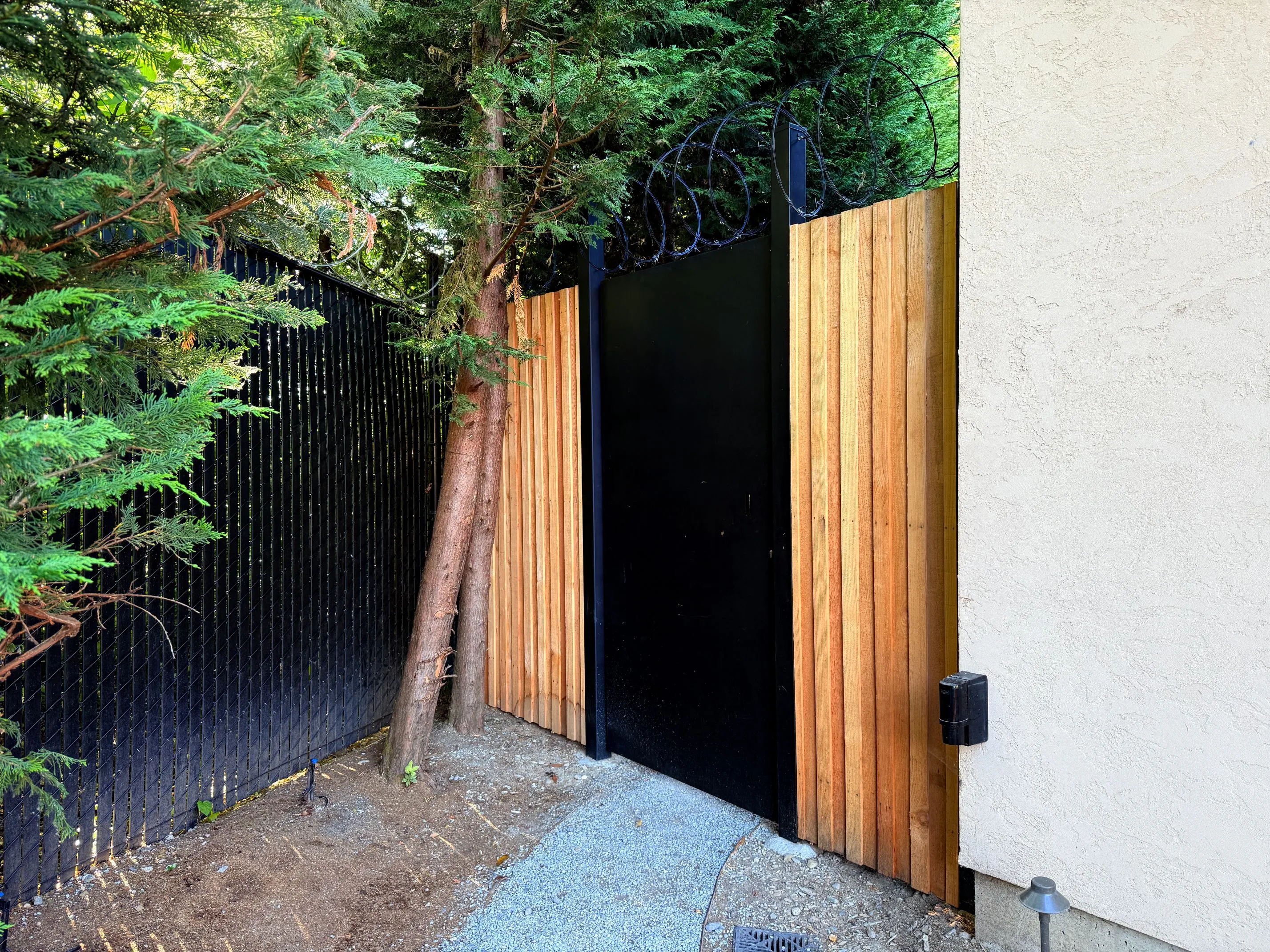 Custom Fences by Optima Fence and Deck