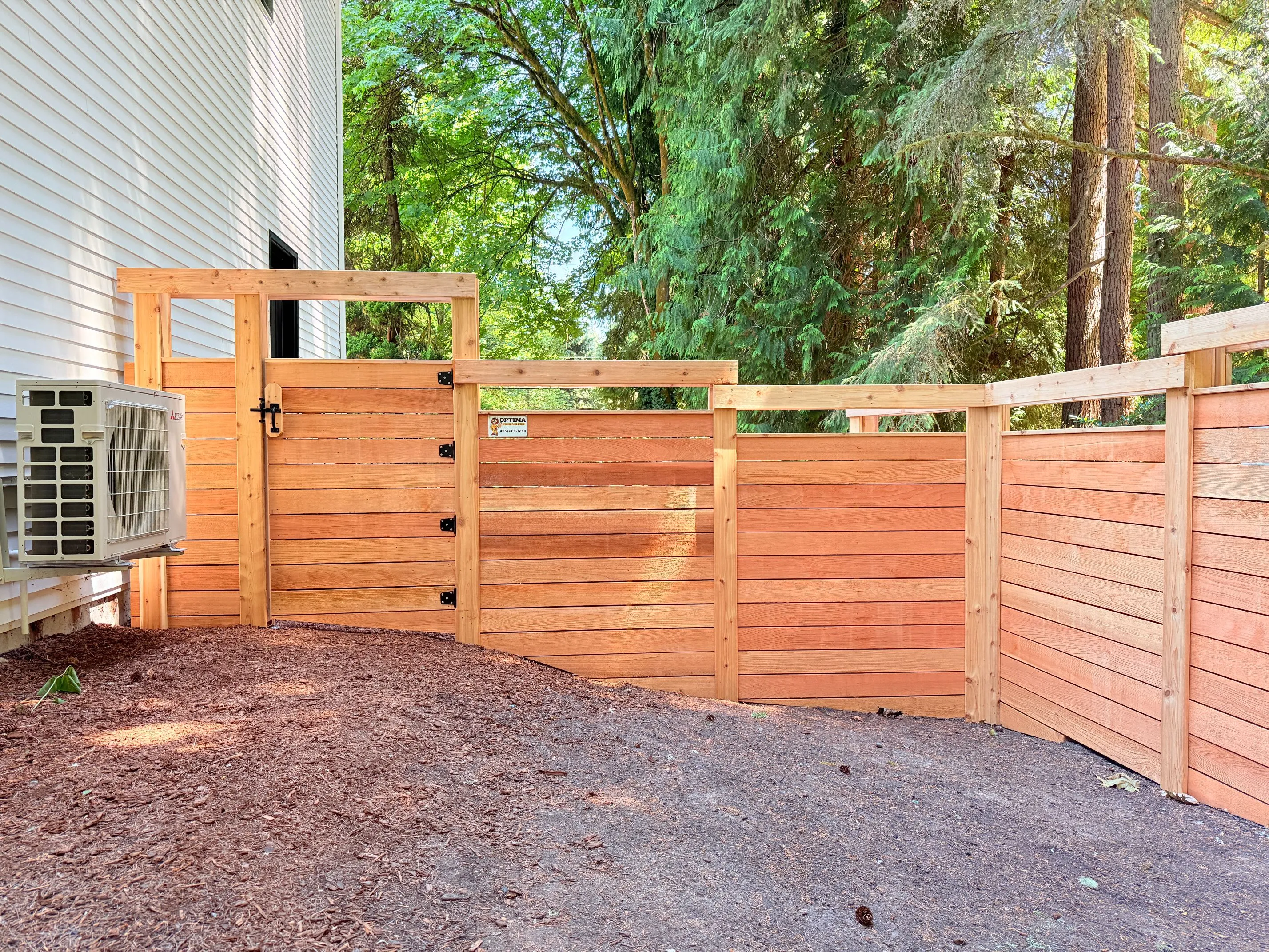 Custom Fences by Optima Fence and Deck