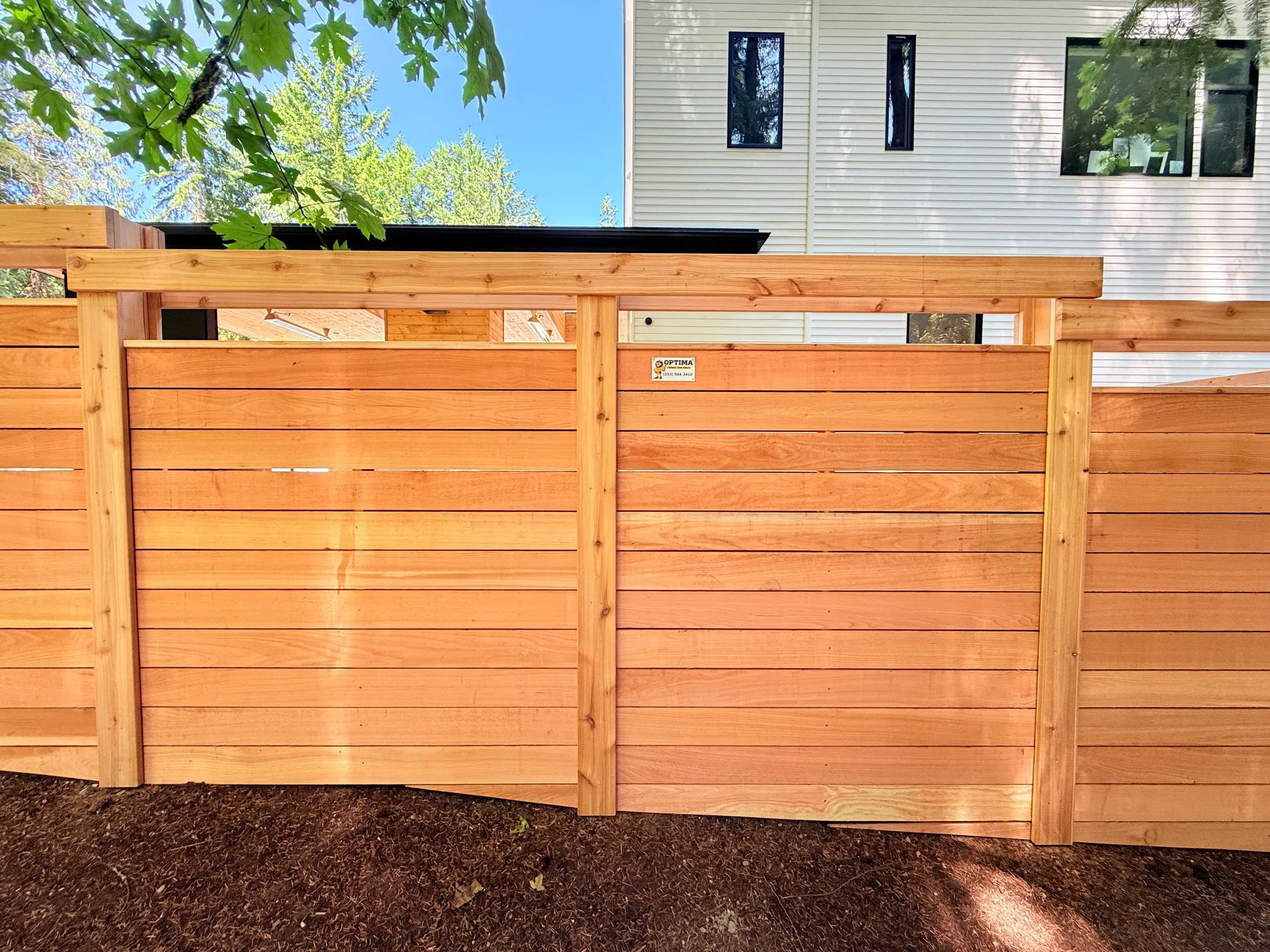 Custom Fences by Optima Fence and Deck