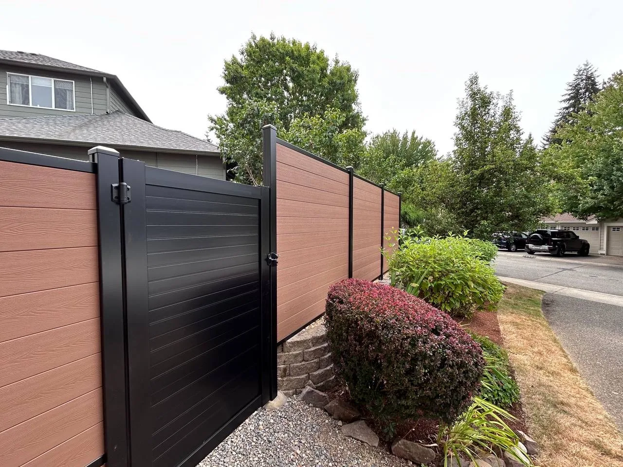Composite fence and gate installed at a Bellevue backyard
