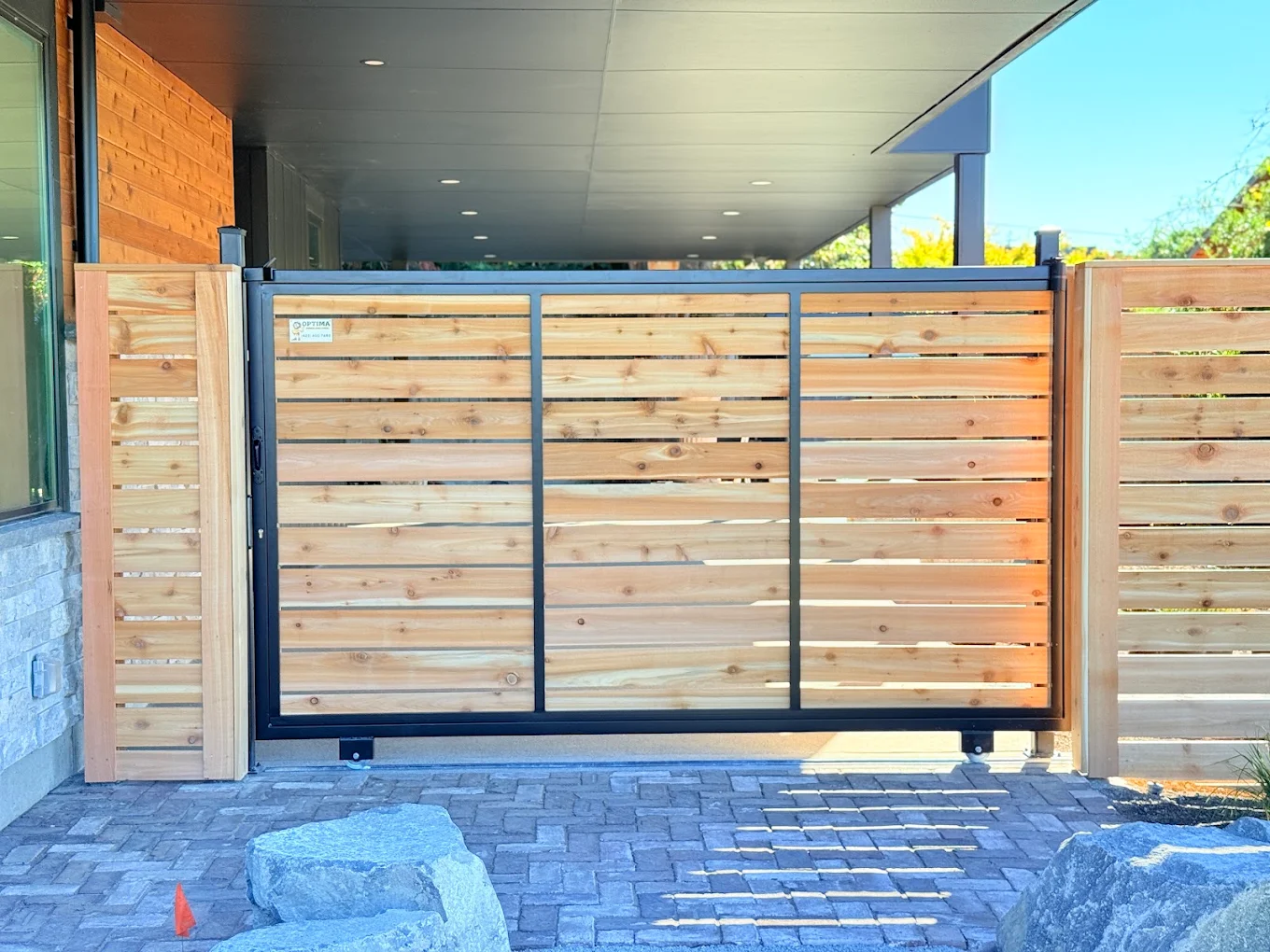 Ashwood fence and gate for driveway security in Bellevue