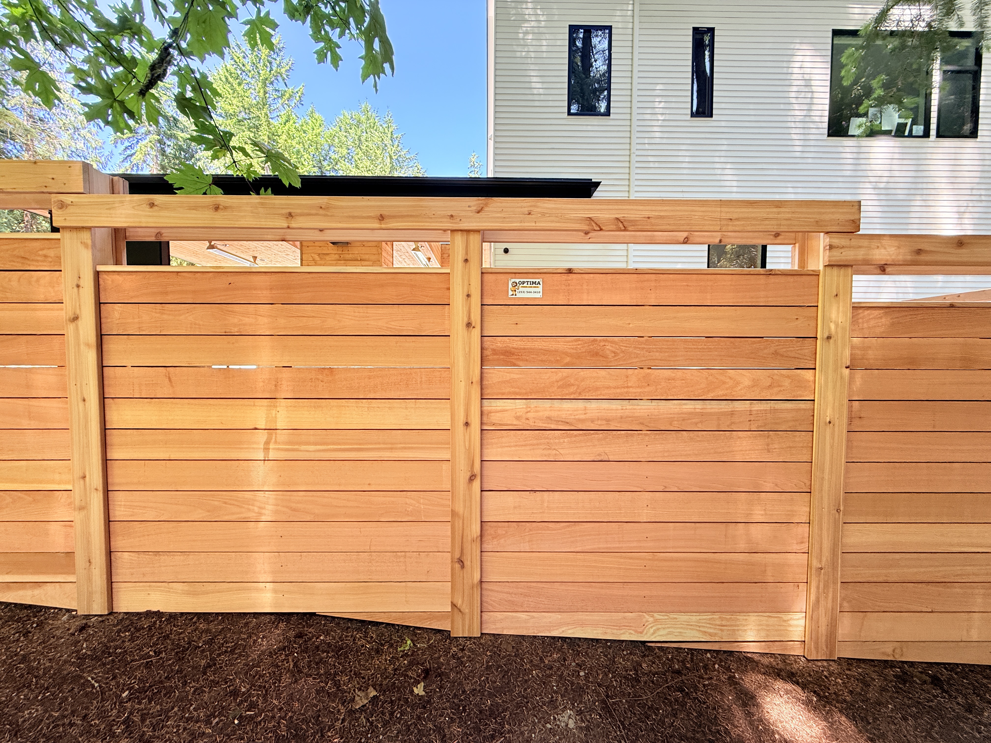 Custom Fences by Optima Fence and Deck 