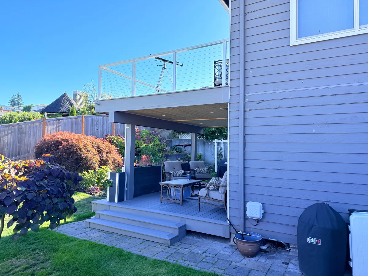 Custom-built deck in Tacoma highlighting composite decking and a weather-protected lower patio