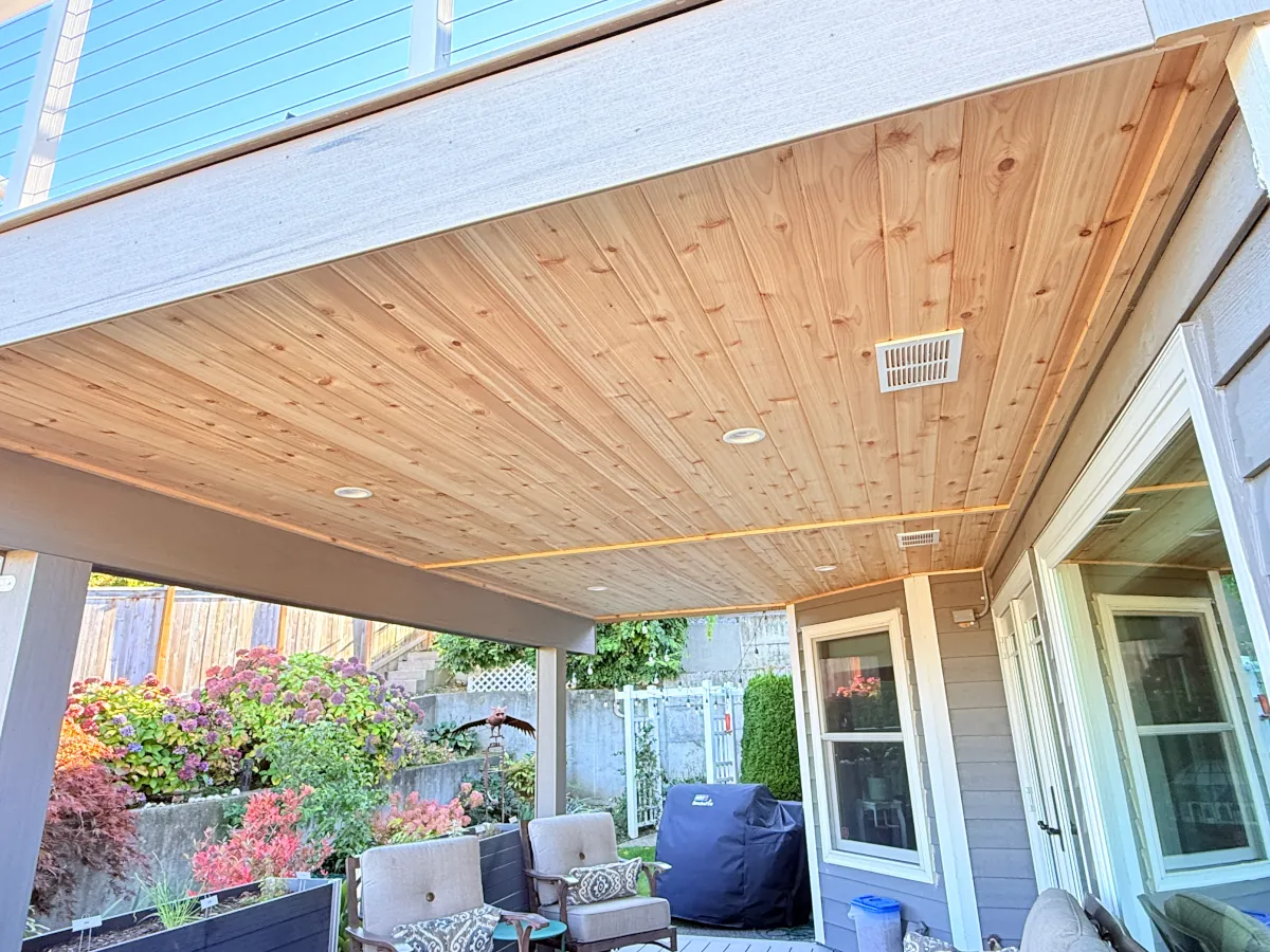 Under-deck ceiling with integrated lighting.