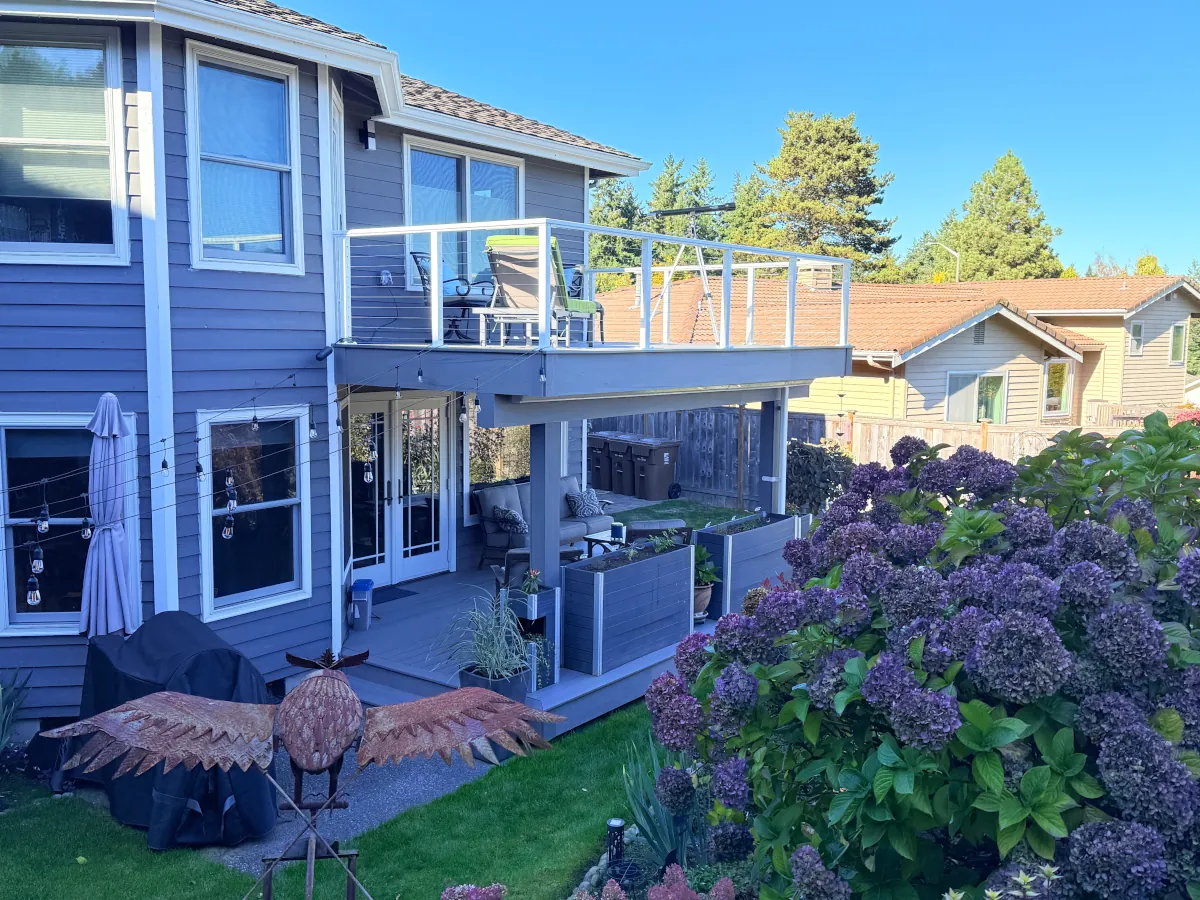 Custom two-story deck attached to a Tacoma home, designed for durability and modern outdoor living