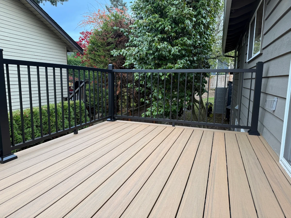 Durable composite deck surface replacing old wood deck in Kirkland Washington