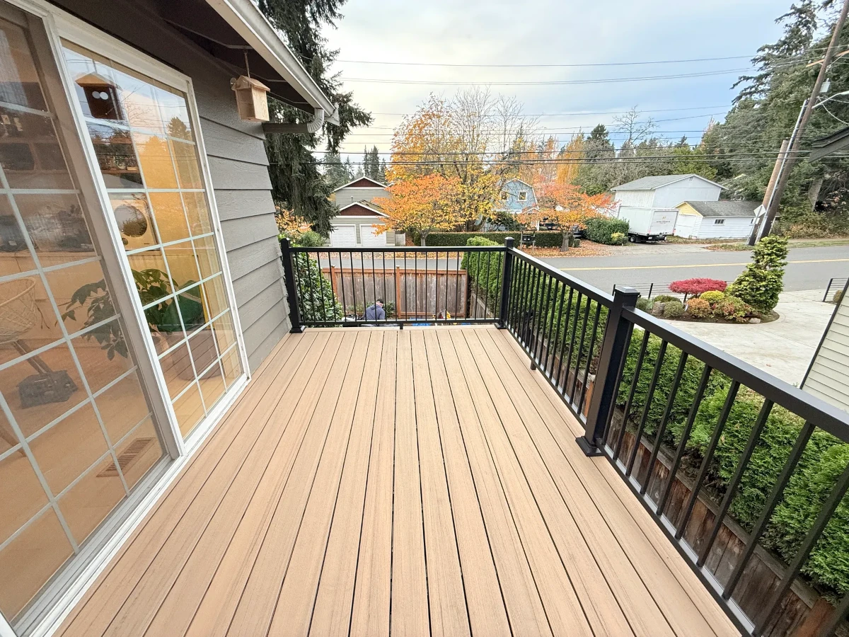 Modern outdoor living space created with composite decking and aluminum railing in Kirkland Washington