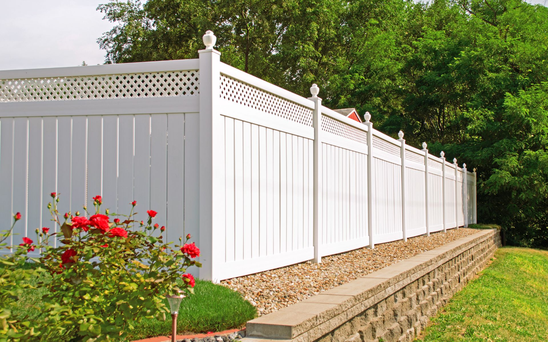 White vinyl fence with lattice top
