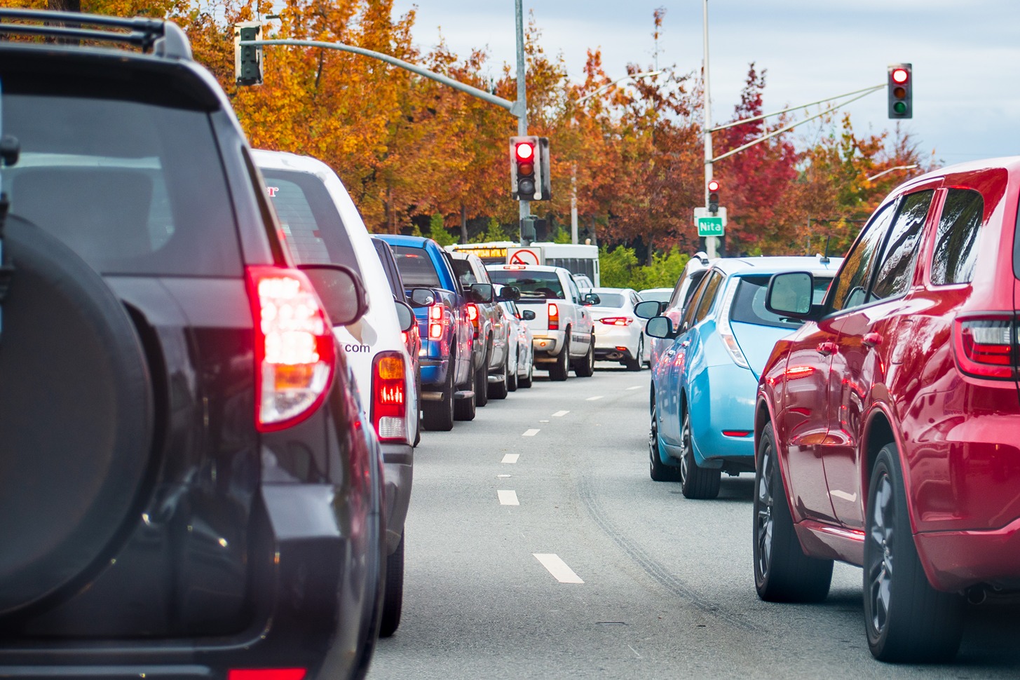 Traffic Jam in City on Autumn Day