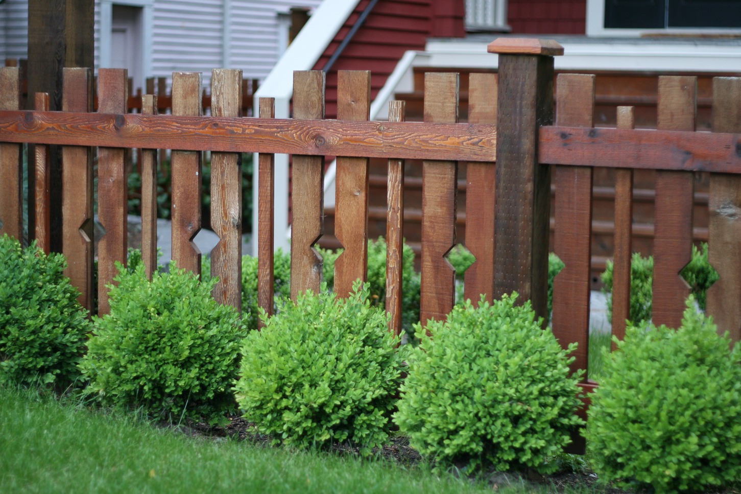 wood fence in a suburban backyard