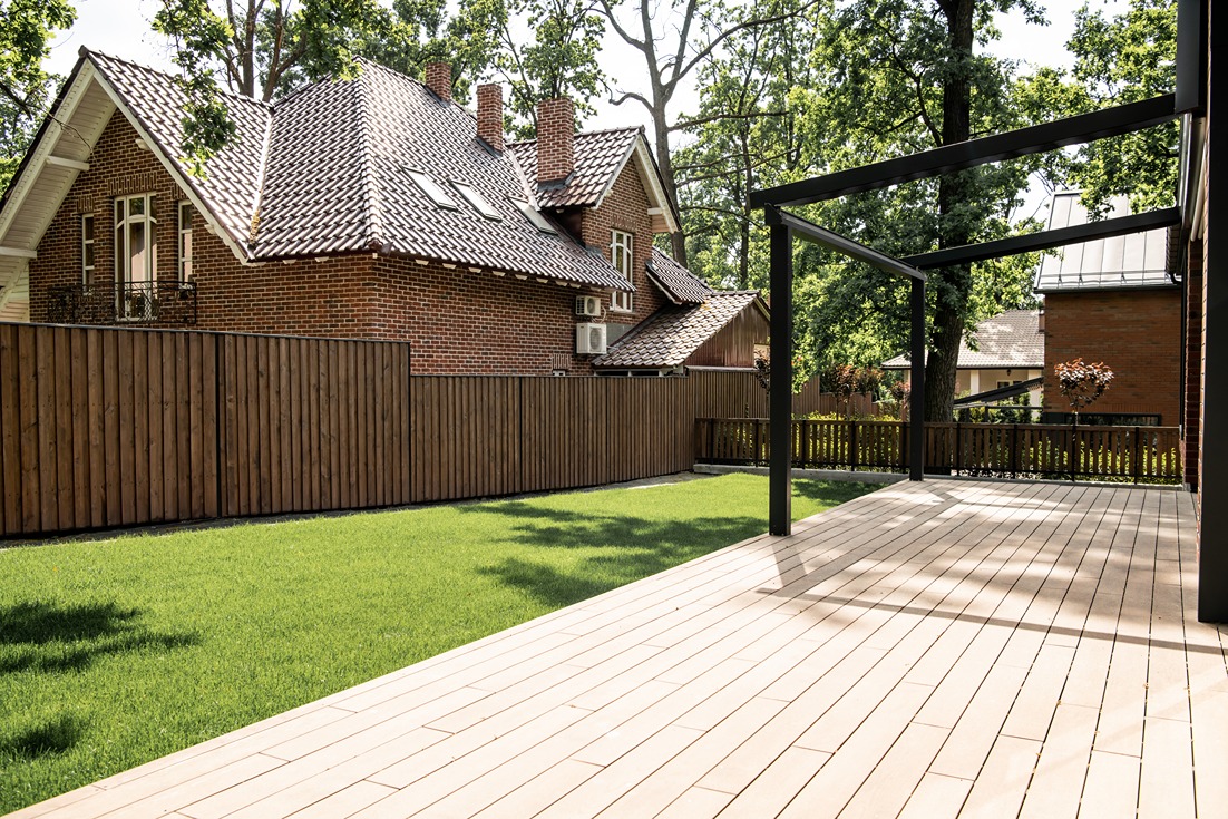 Backyard with new wood privacy fence