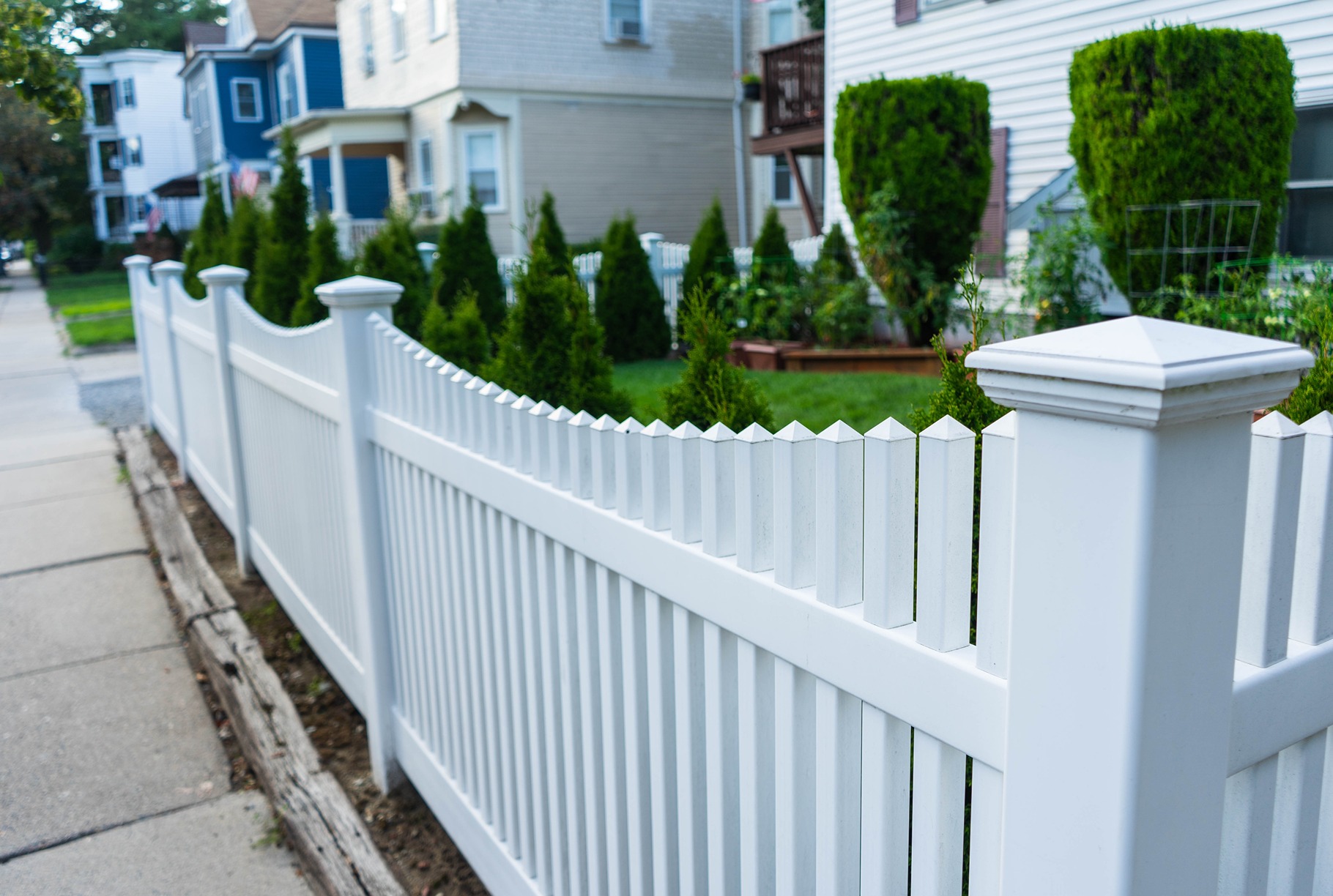 Backyard privacy fence idea using vinyl fence materials for long-term value.