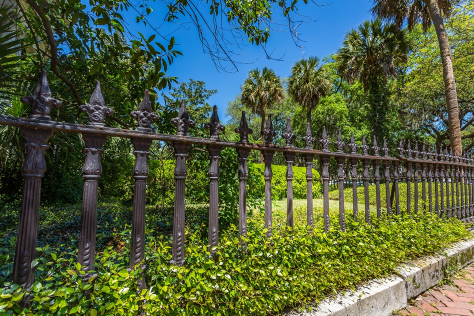 Traditional wrought iron fence style for garden fence