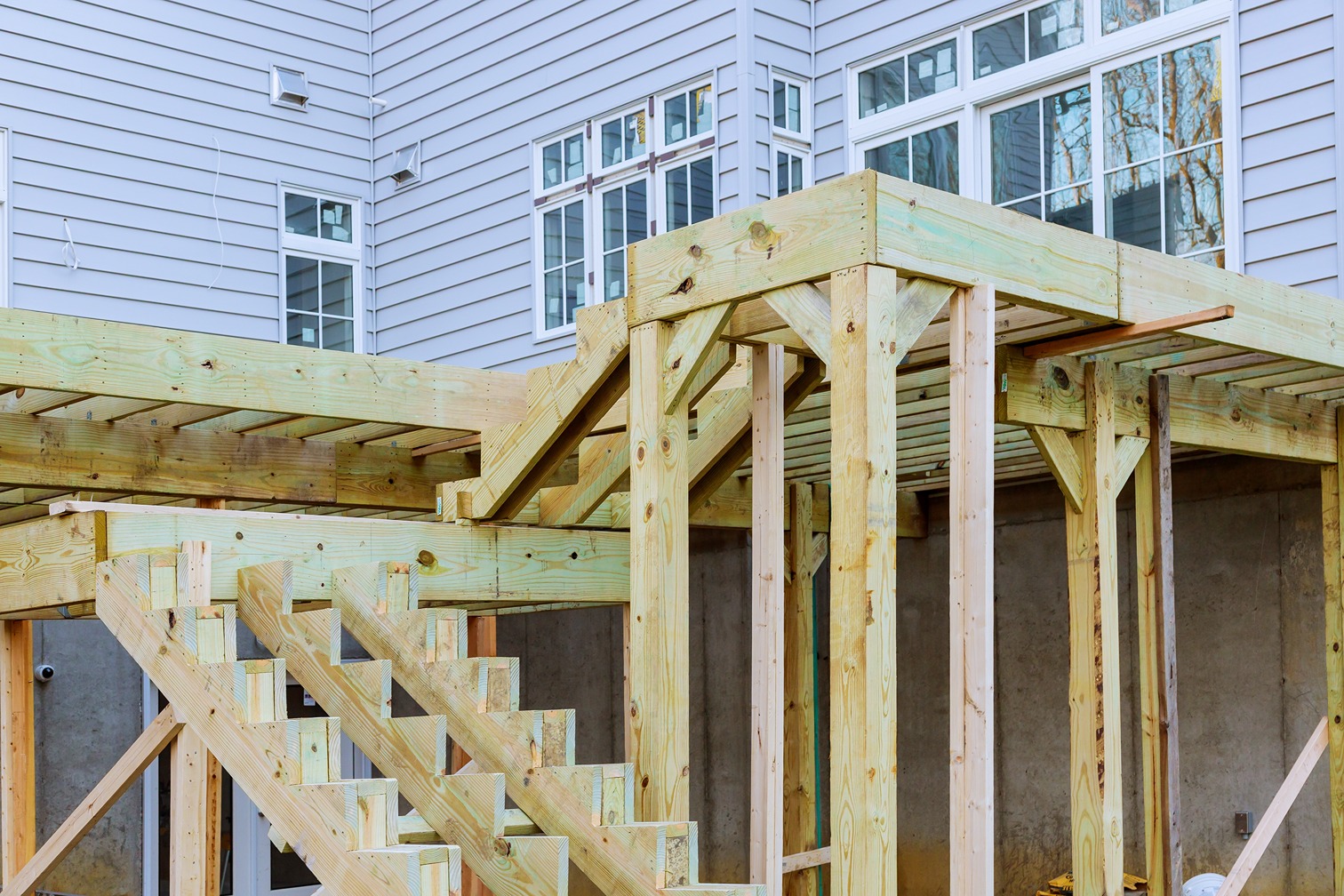A multi-level deck under construction at a home in Bellevue