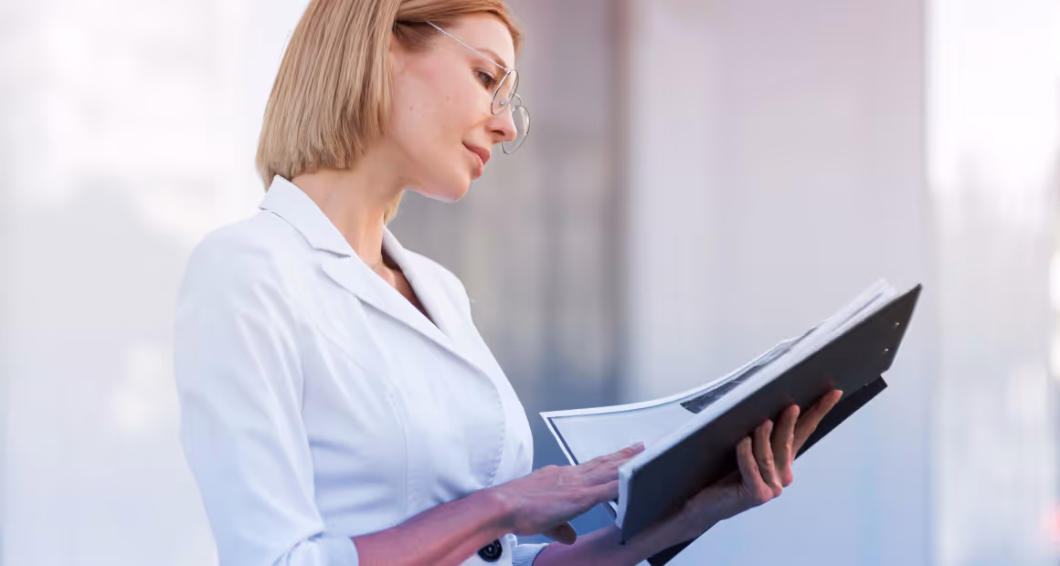 A professional woman reading a chart