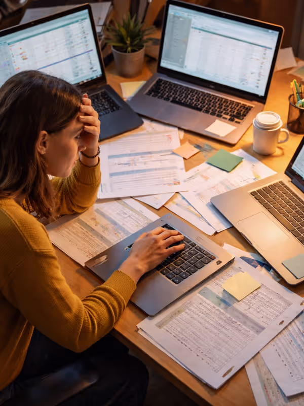 a case worker overwhelmed with technology