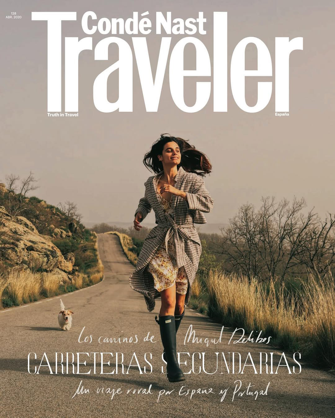 Older man wearing dark sunglasses and a navy sweater sitting at a table, holding a white gift box with a red ribbon, with text saying 'Sunnies that say "I know what I like"'.