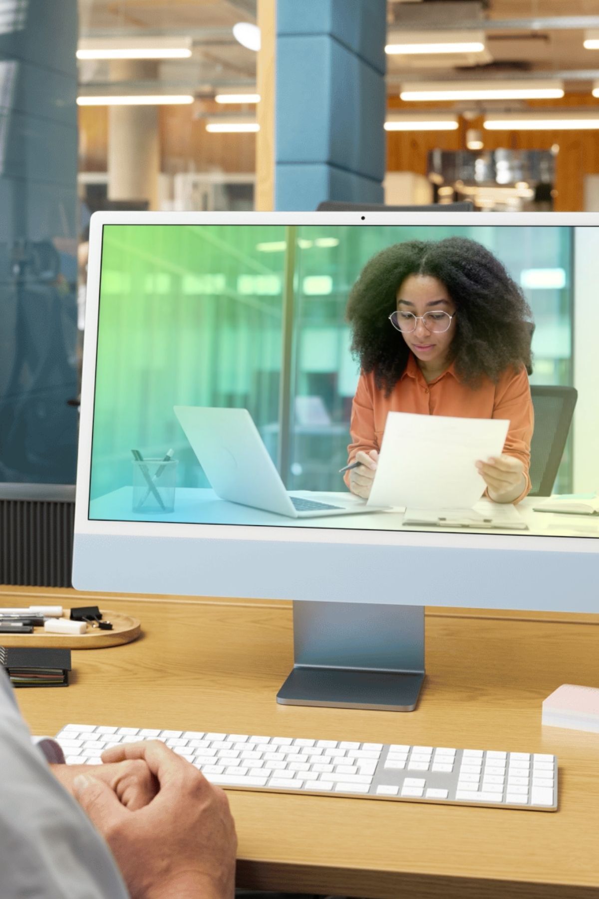 A video showcasing Monoline's SimpleSwitch features on a desktop computer screen on an insurance agent's desk
