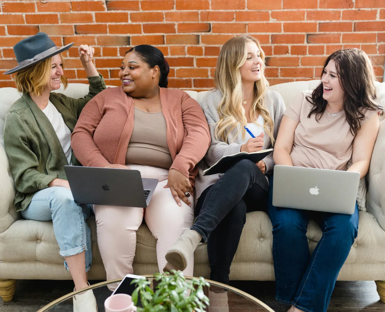 a group of entrepreneurial women on a couch
