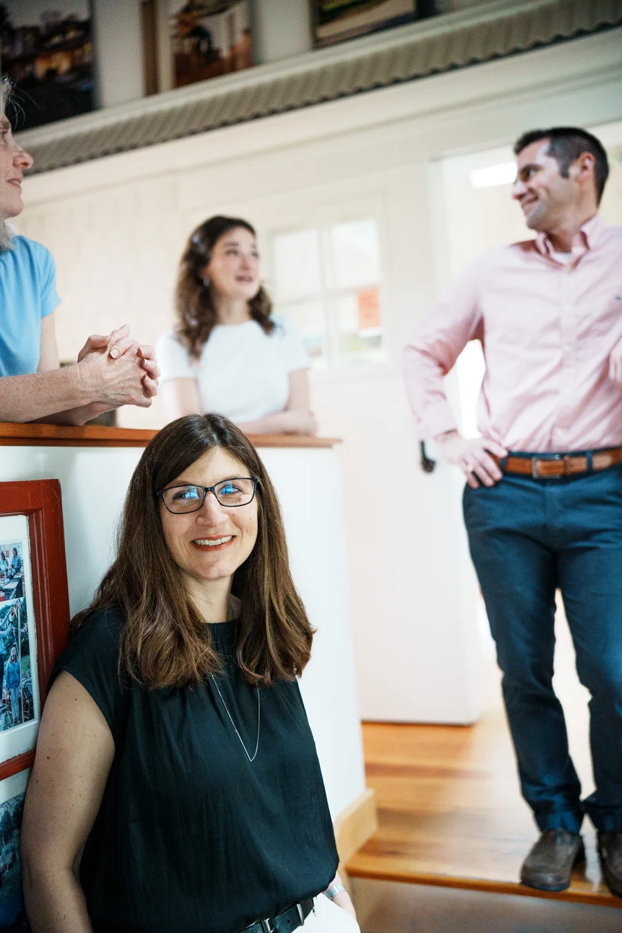 Members of the BNA team hanging out in office hallway