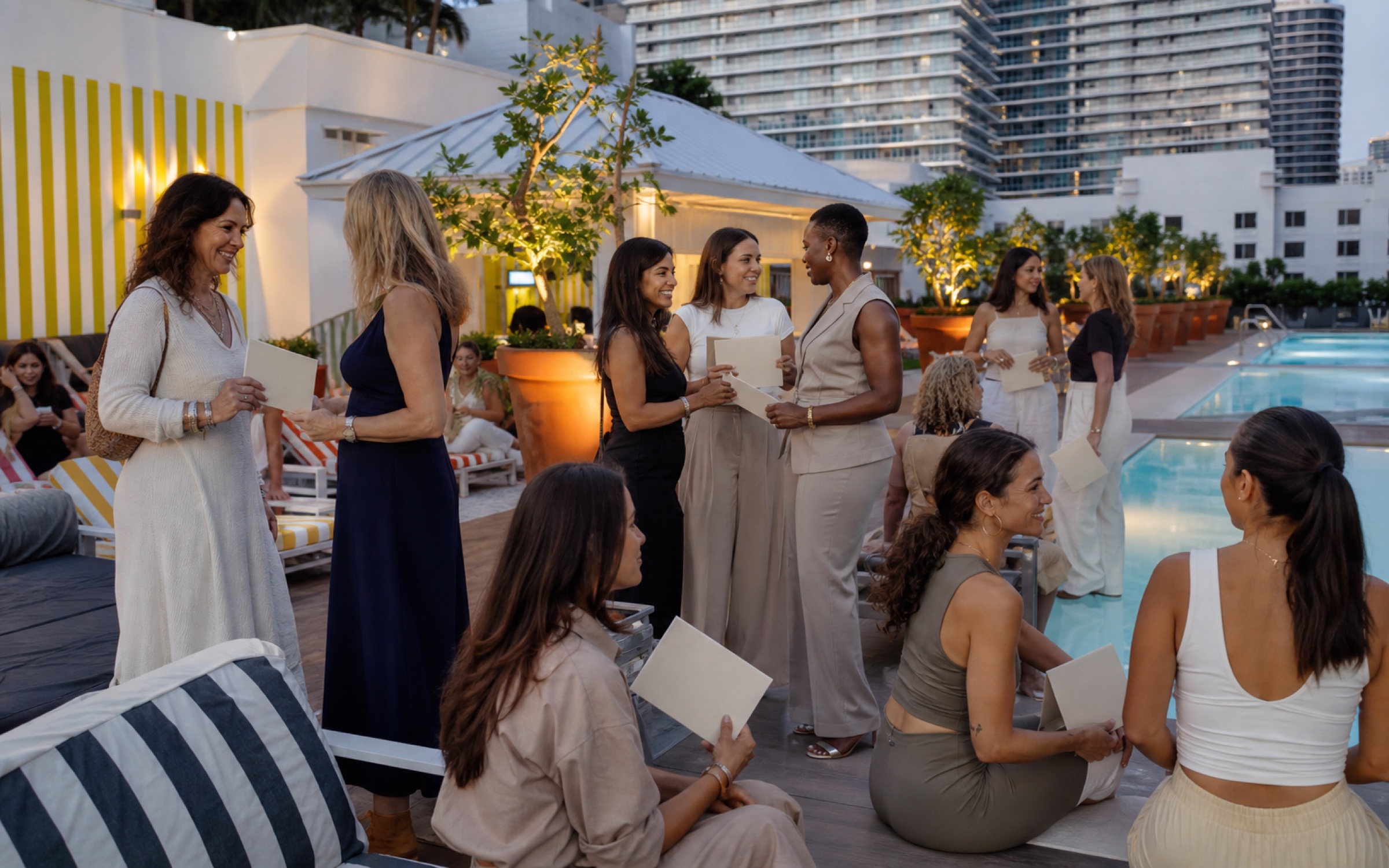 Guests gathering at golden hour at Experiment U in Miami