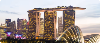 Marina Bay Sands and the Singapore skyline at dusk, location of Finova Singapore