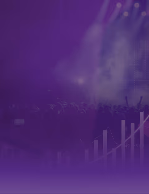 Blurry crowd at a concert with stage lights and purple overlay.